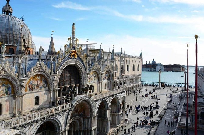 Morning Venice Walking Tour plus St Mark's Basilica Guided Visit - Reaching Rialto Bridge and the Grand Canal