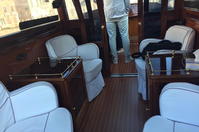 Private Arrival Transfer from Marco Polo Airport to Venice - Boarding the premium or luxury water taxi
