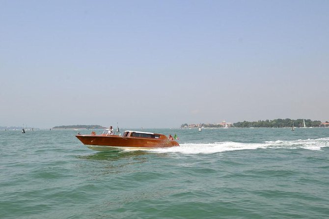 Private Departure Transfer: Venice Hotels to Venice Train or Bus Station - A short water taxi ride that can save a long morning