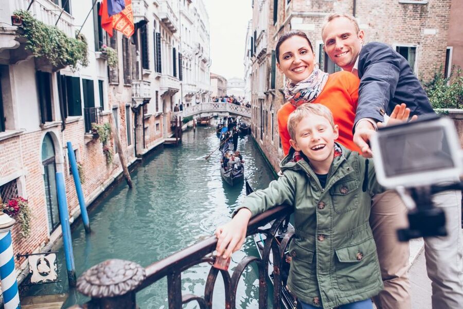 Private Family Tour of Venice with Fun Activities for Kids - Crossing Rialto Bridge into old Venice