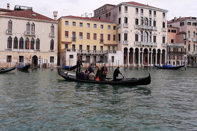 Rialto Market & Seafood Cooking Class in Murano - Cooking seafood with a view over the canal