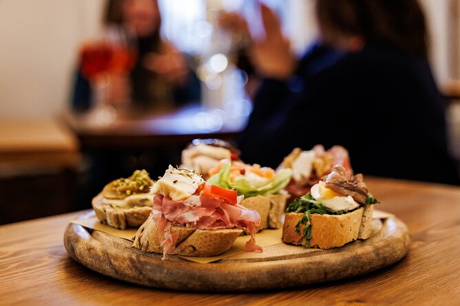 Venice Evening Food Tour: Bites, Drinks & Sit-Down Dinner - Stop two: fish cicchetti and an ombra