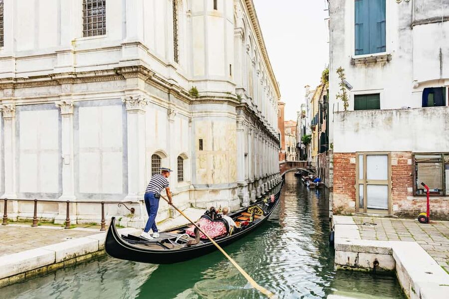 Venice: Highlights and Hidden Gems Night Walking Tour - Churches, palaces, and water reflections