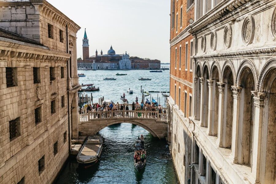 Venice: Private Entry Doge Palace & St. Mark Terraces Tour - Walking through the Bridge of Sighs