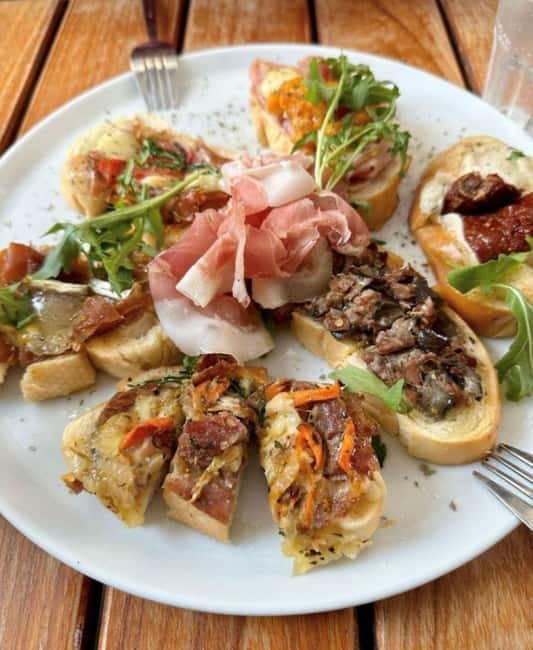 Venice: Rialto Market Street Food Tour - Cheese and regional food at Aliani Casa Del Parmigiano