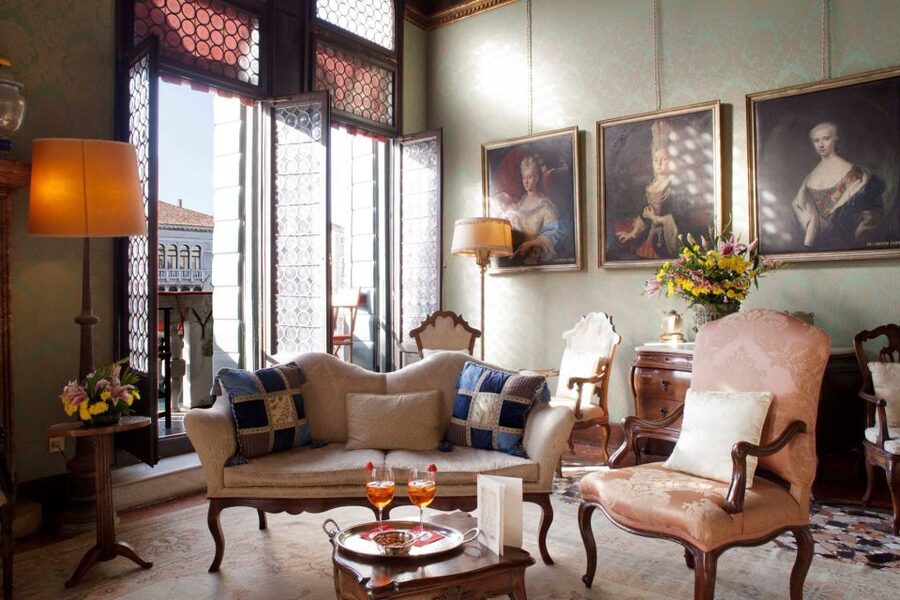 Venice: Romantic Palace Dinner and Private Gondola Ride - A gondola entrance to Venice’s evening