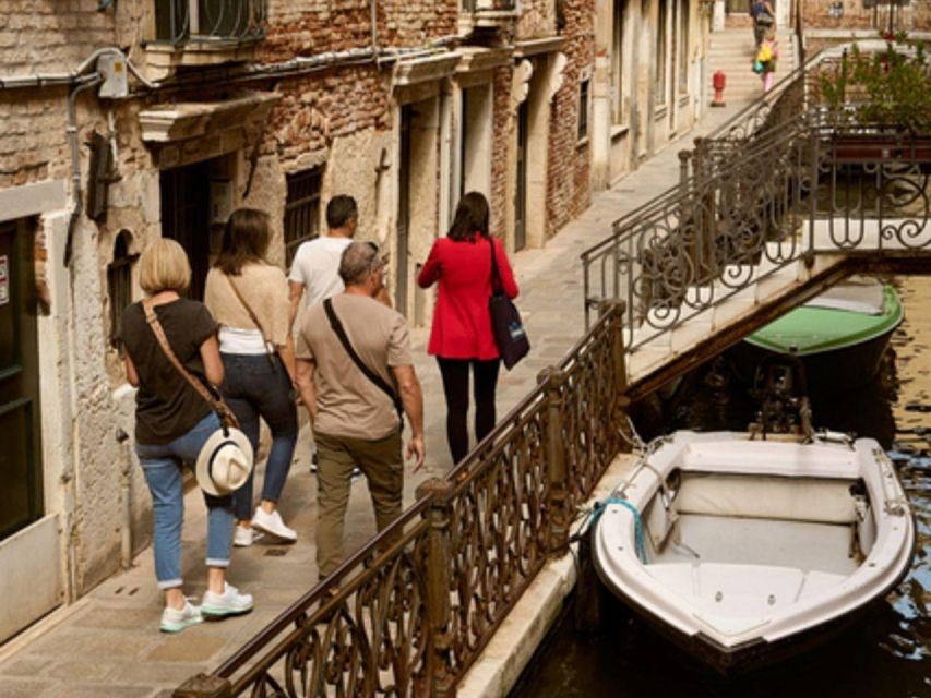 Venice: Vip Semi-Private Walking Tour with Gondola Ride - Starting beneath the lion in St Mark’s Square
