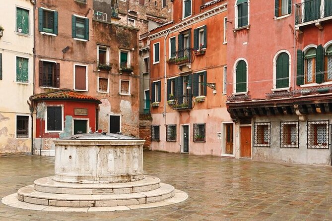 Venice Walking Tour with Gondola Ride Experience - A Venetian campo, theater, and beautiful church